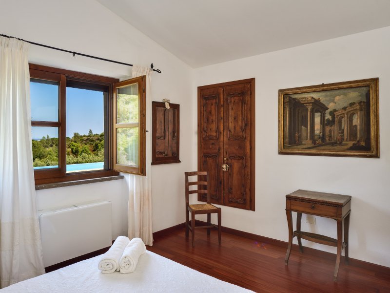 Schlafzimmer mit Blickauf Pool und Meer Schlafzimmer mit Blickauf Pool und Meer