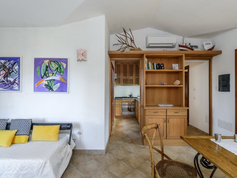 Wohnzimmer Casa Grazia mit Zugang zur Küche und zu dem Schlafzimmertrakt Wohnzimmer Casa Grazia mit Zugang zur Küche und zu dem Schlafzimmertrakt