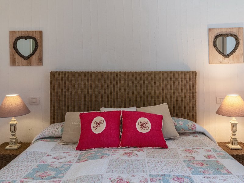 1. Schlafzimmer im Obergeschoss mit Doppelbett